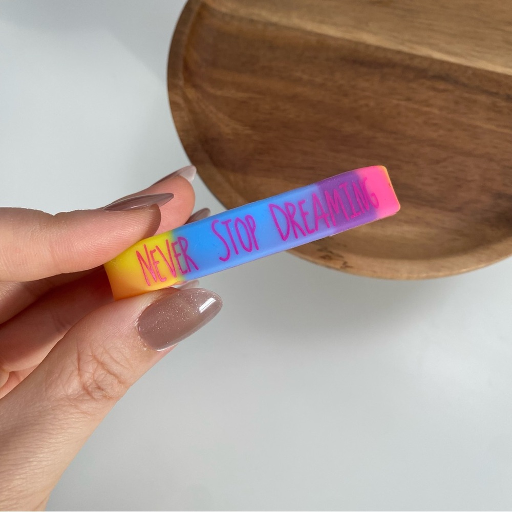 4/$15 Never Stop Dreaming Rainbow Silicone Bracelet